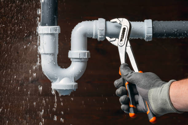 Professional Emergency Plumber technician working in Arona, PA